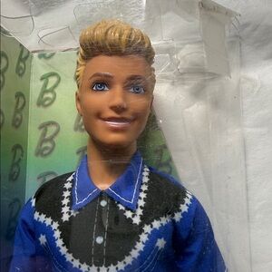 Barbie Ken Doll 65 Anniversary Cowboy in Blue and White Outfit. Box Damaged. 12’